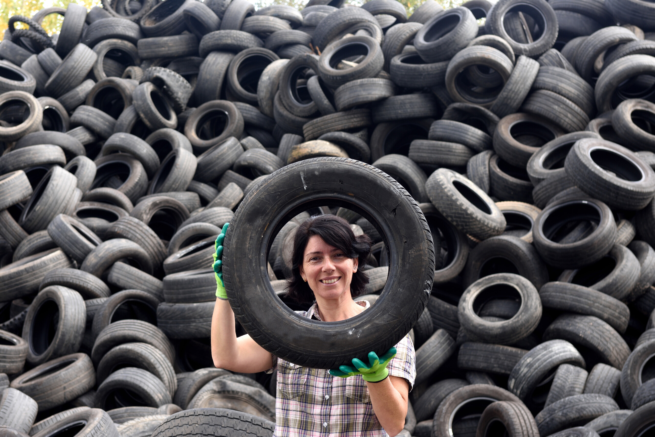 woman in a tire recycling plant